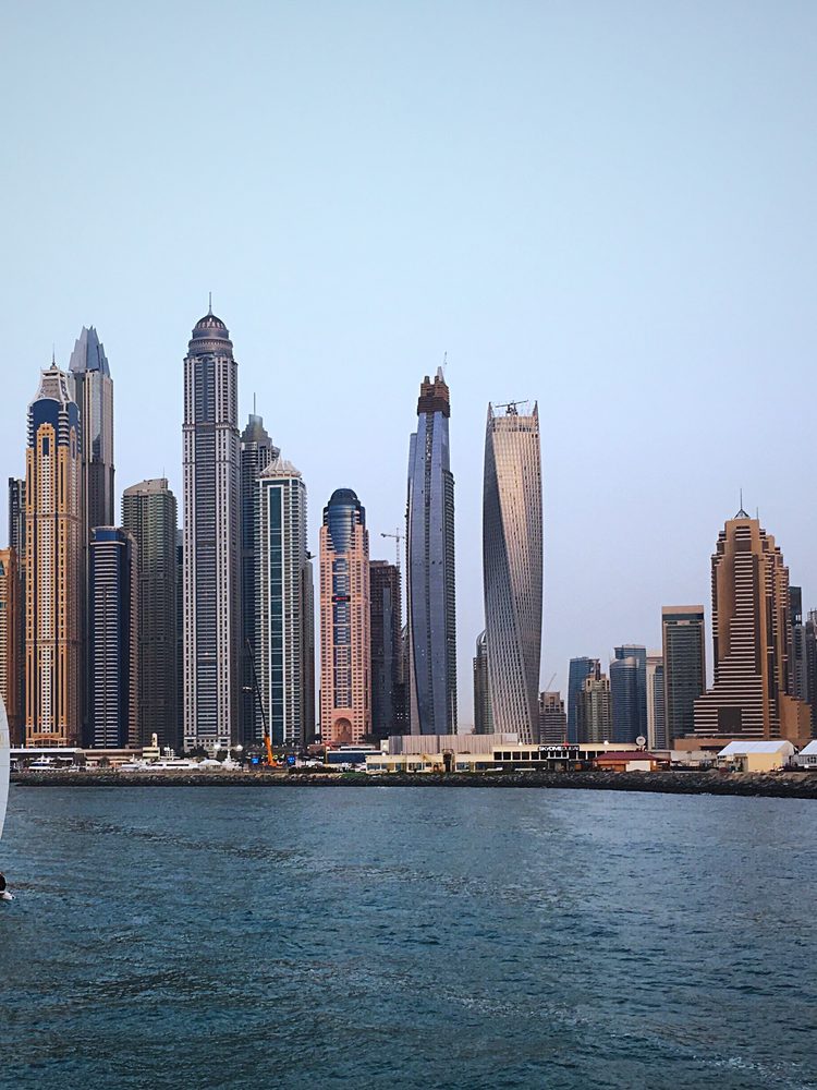Sailboat in front of the Dubai Marina skyline