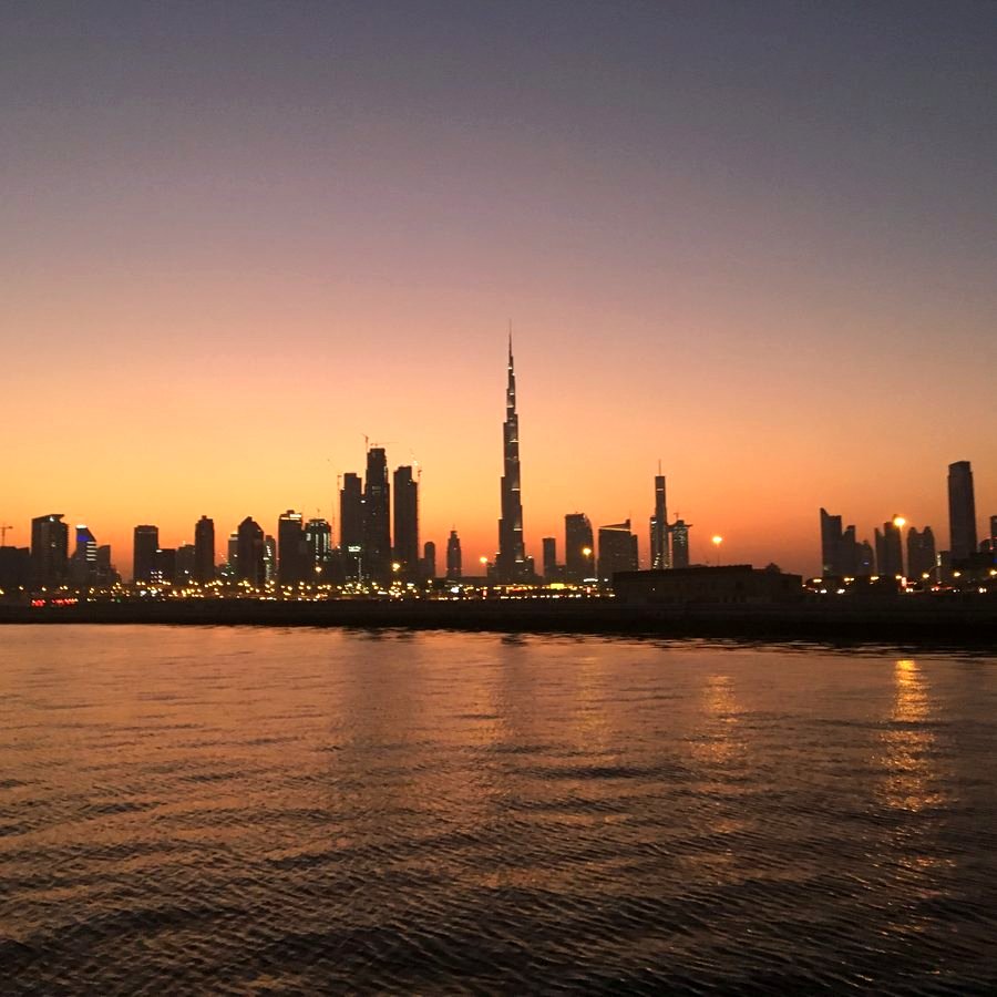 Burj Khalifa and Dubai skyline at sunset